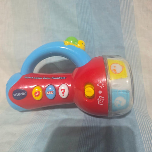 VTech Spin & Learn Color Flashlight features a color-changing ring that illuminates Pretend Toy