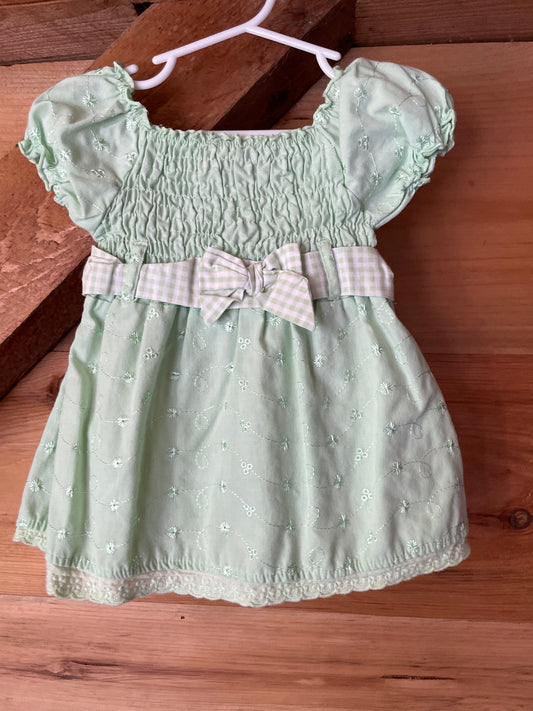Little Lass, 12m Green dress with flower embroidery and belted bow. 12 Months