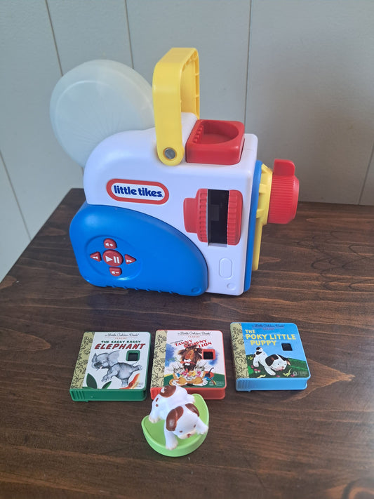 Little tikes Dream Machine w/3 stories included Projects picture on wall and reads story aloud Video Gaming