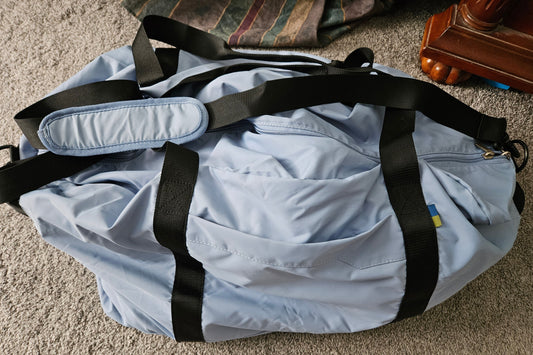 Open Story 100L packable duffle bag light blue softside carryon travel - used once Luggage