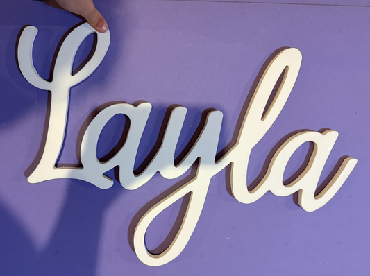 Wooden Name sign for above crib- from Etsy Layla 22.25 inches long Wall Hanging