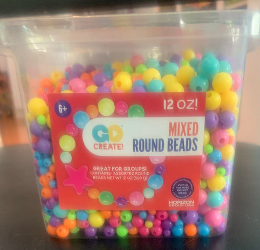 Create mixed plastic round beads Box of assorted sized, colorful round beads. New