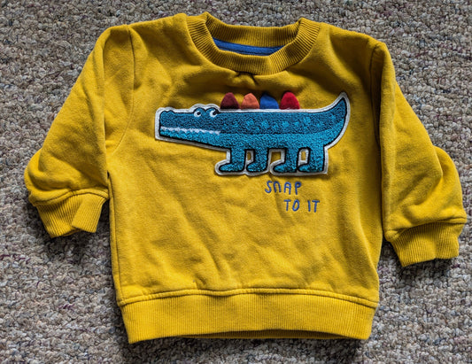 Next: 9-12 months Yellow sweat shirt with alligator "snap to it" 9 Months