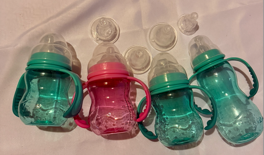 Nuby Bottle to cup Nuby Bottle to cup. 4 anti colic nipples, 4 spout nipples Feeding