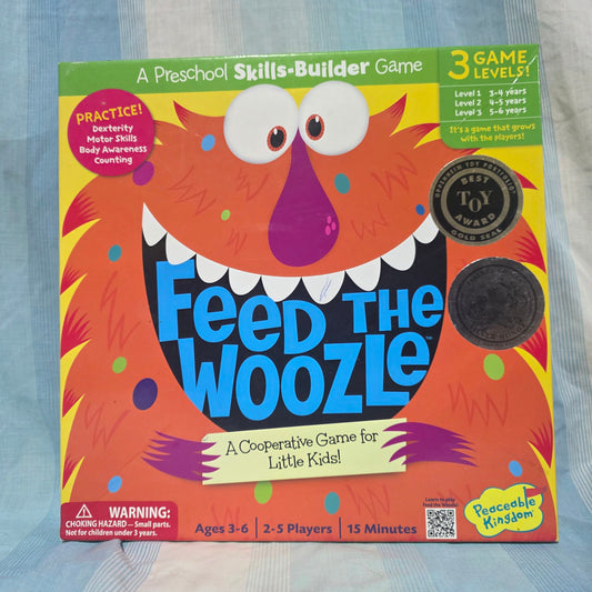 Peaceable Kingdom Feed the Woozle preschool game developing fine gross motor skills, counting, and body awareness Games