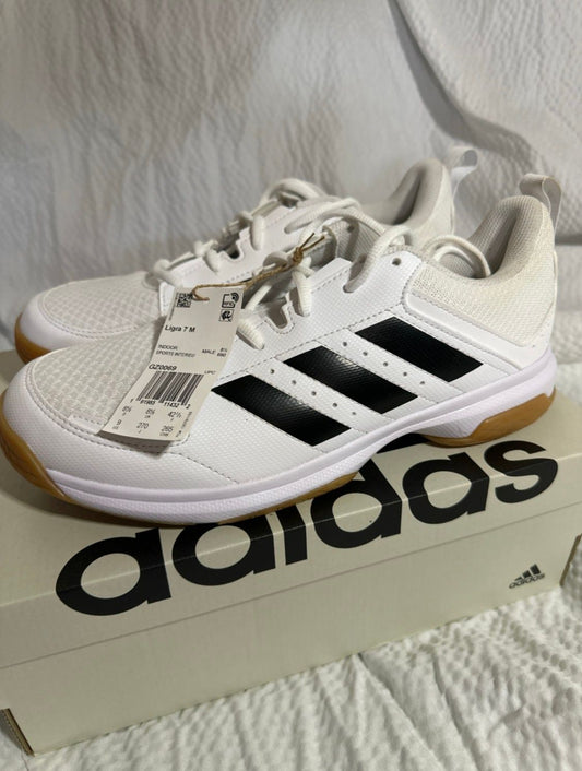 ADIDAS. Size 9. NWT. Ligra7M Court Shoes White, black stripes, non-marking soles. 9 (Adult)
