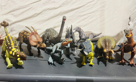 Miscellaneous Dinosaur figurines with moving arms and legs 9 total Figures and Animals
