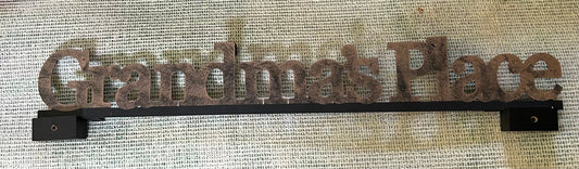 Metal sign, grandmas place 27 inches long attaches to wall with two screws Decor