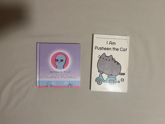 Bundle of 2 pop culture comic books:Strange Planet by Nathan Pyle & I Am Pusheen the Cat by Claire Belton Graphic Novel
