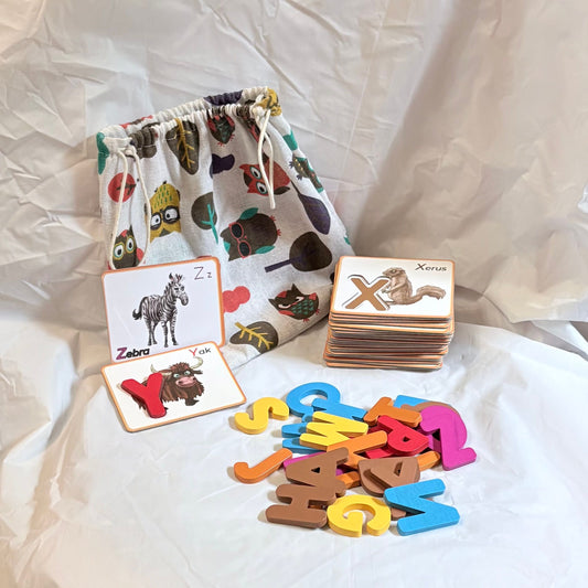 Woven owl print bag with alphabet letter puzzle Cards with animals and wooden letters to fit each Games