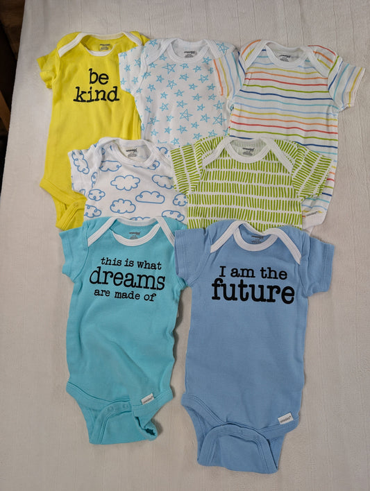 Onesies brand 3-6 month 7 onesies unisex 7 different onesies, could be considered unisex, never worn 6 Months