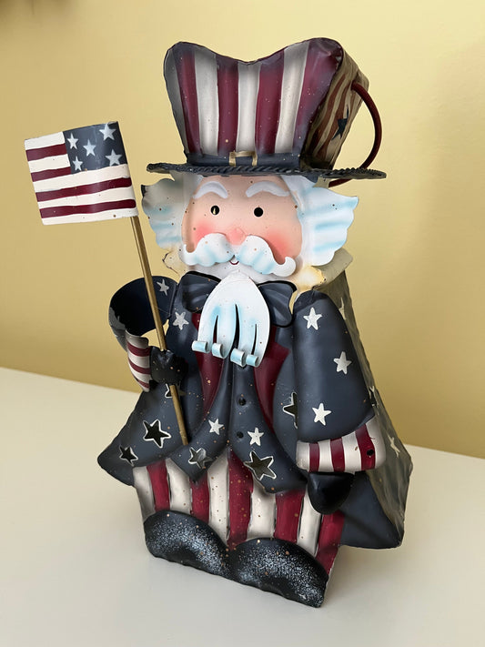 Metal Uncle Sam decor 11in x 7in x 5in Insert tea light or votive in the back and handle on top to hang Holiday