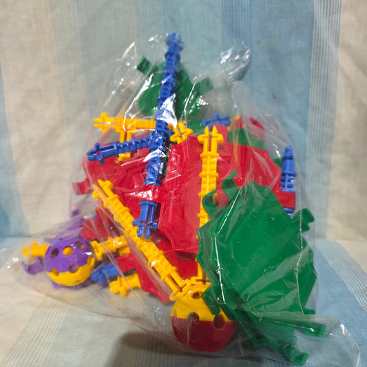 IQ Builder STEM Learning Toy set. multi-colored construction pieces used for educational building. Building