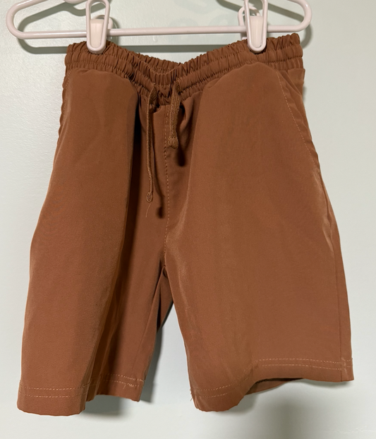 Stitch and stone Tan shorts. Thin. 87% polyester Junior 7