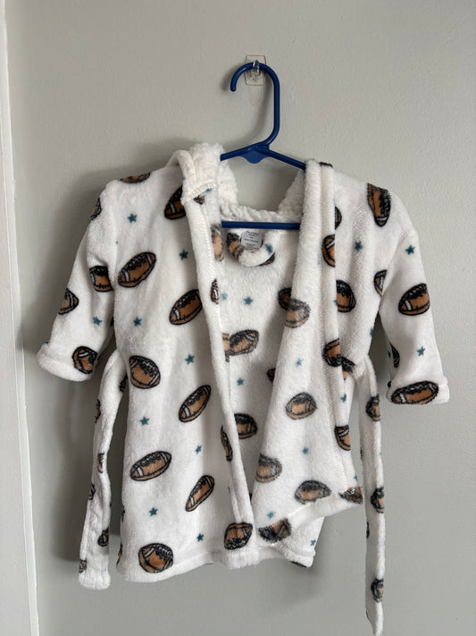 Modern Baby Soft, hooded, baby bathrobe with football print. Size 0-9 months. 9 Months