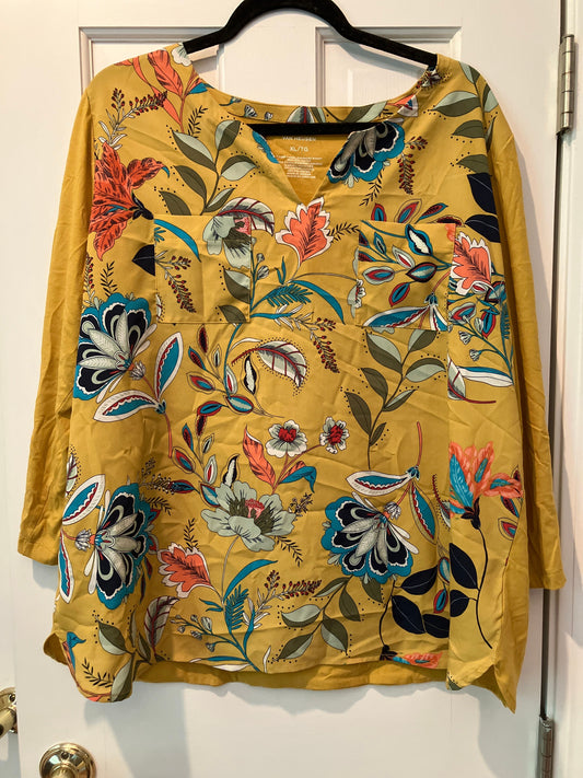 Van Heusen size xl three quarter sleeves, v neck 2 real front pockets, back is solid color no pattern Women's - XL