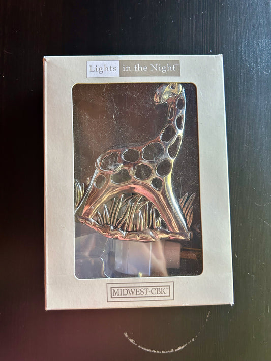 Midwest CBK Giraffe Nightlight New in Box Features giraffe silhouette with cutout spots, swivel plug in Decor
