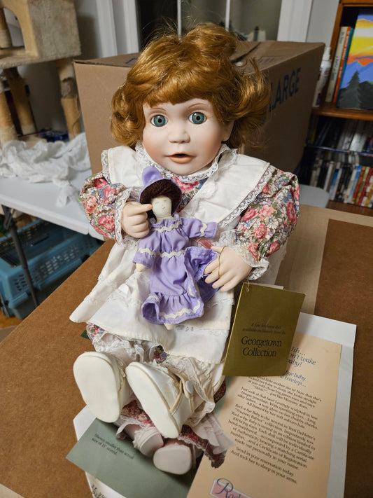 Georgetown Collection Porcelain doll, Teri DeHetre Rock-a-Bye Baby w/ papers, red-headed toddler w/ doll Dolls and Accessories