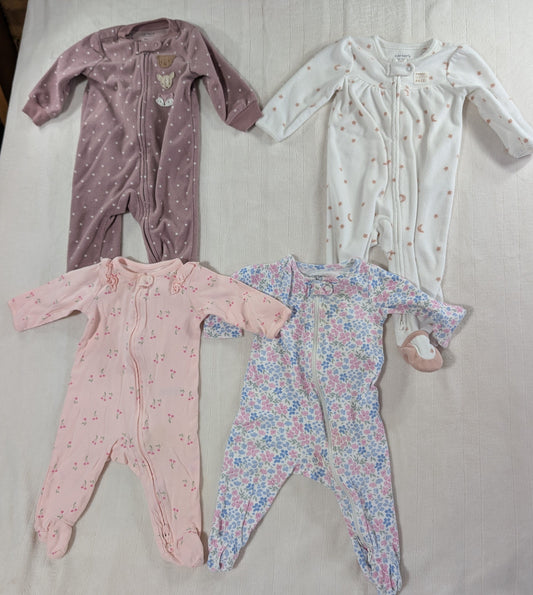 Carter's 6 month footed sleepers Lot of 4 Carter's girl's footed sleepers 6 Months