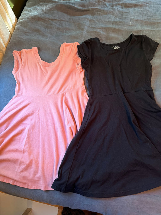 Place Two short sleeve twirly dresses, one new with tag 7
