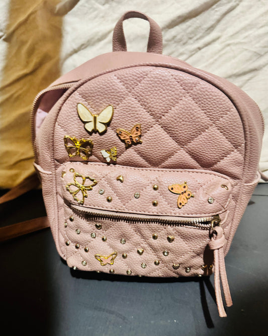 Under One Sky Pink leather backpack w butterflies Pink leather backpack with butterflies, from TJ Maxx Purse