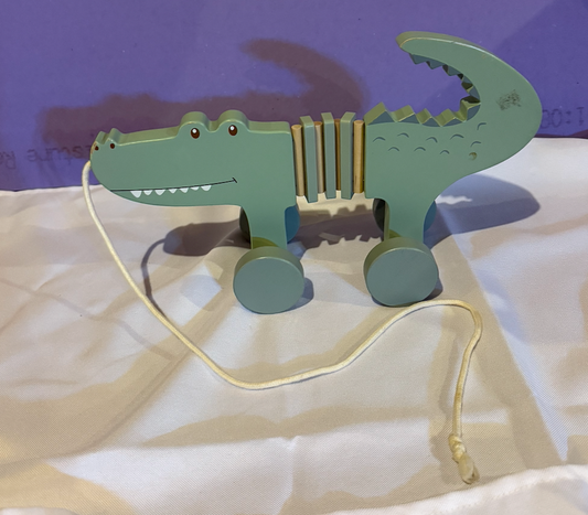 Alligator- Pull behind Pull behind toy alligator. Figures and Animals