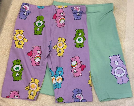 H & M girls bike shorts size 10, set of 2, NWOT 1 green, 1 purple, both with Care Bears 10