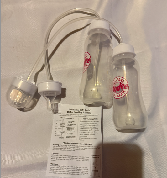 Podee Bottles 2 self feeding infant bottles. Never used. Feeding