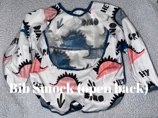 Dinosaur bib smock with open back Dinosaur bib smock with open back Feeding