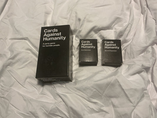 Cards against humanity Original with two expansion packs Miscellaneous