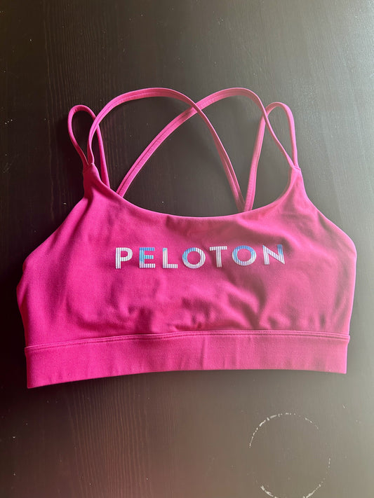 Peloton Size M Pink Magenta Strappy Sports Bra crisscross back design, Peloton logo graphic, removable cups Women's - M
